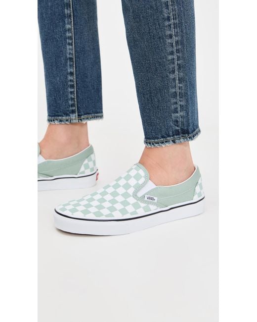 Vans White Classic Slip-On Sneakers