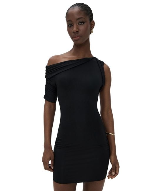 cream and black polka dot dress Matthew Bruch
