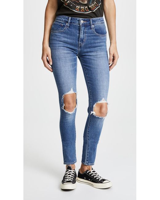 Levi's 721 High Rise Distressed Skinny Jeans in Blue | Lyst
