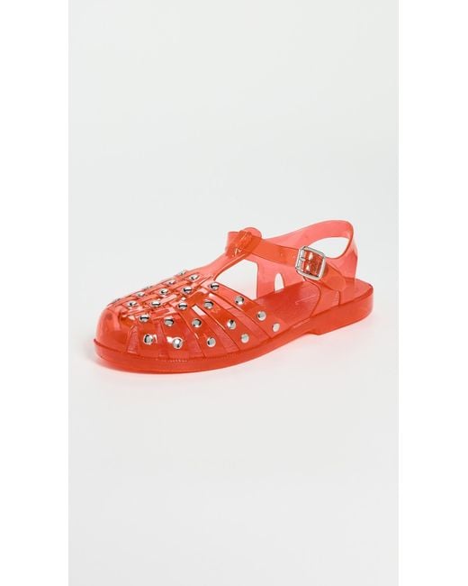INTENTIONALLY ______ Red Ellery Studded Jelly Sandals