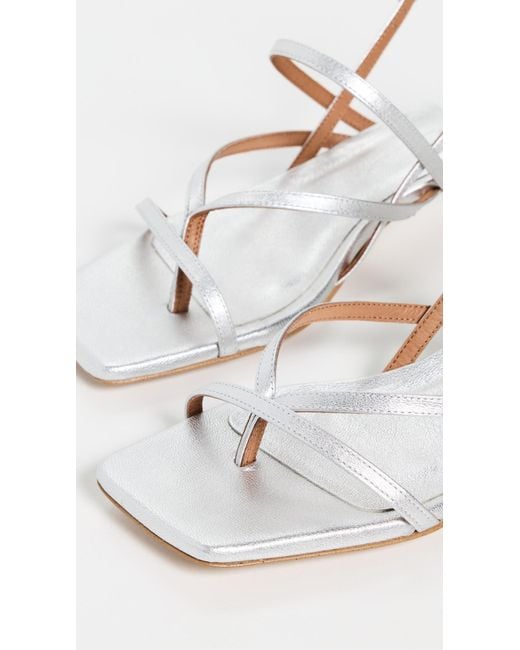 INTENTIONALLY ______ Black Pup Sandals