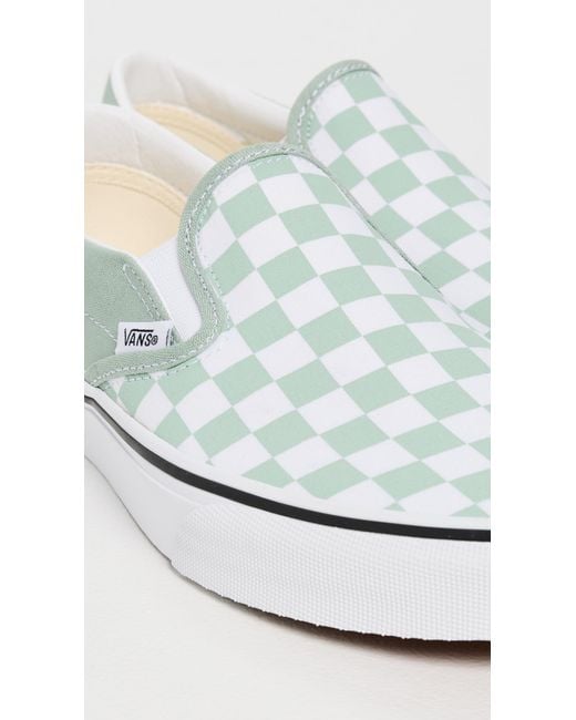 Vans White Classic Slip-On Sneakers