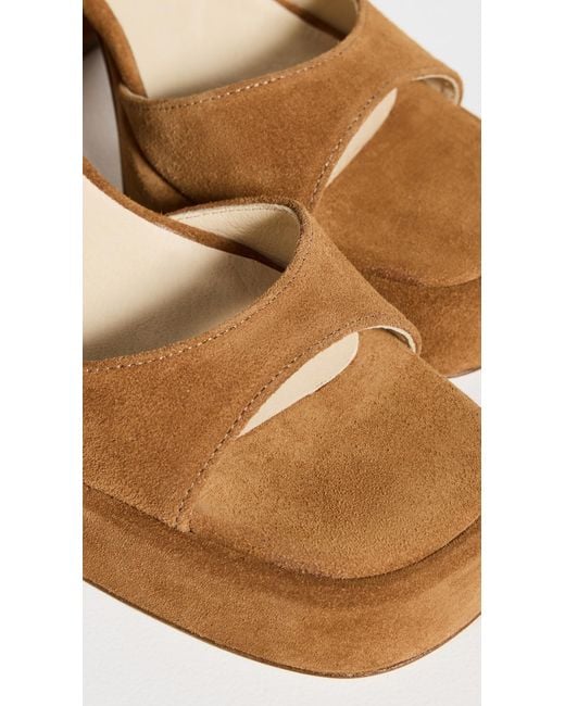 INTENTIONALLY ______ White Tune Sandals