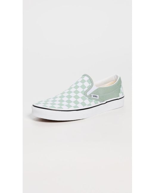 Vans White Classic Slip-On Sneakers