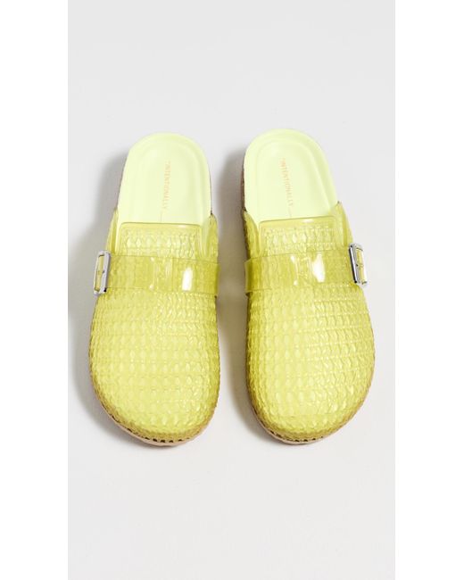 INTENTIONALLY ______ Yellow Seth Jelly Clogs