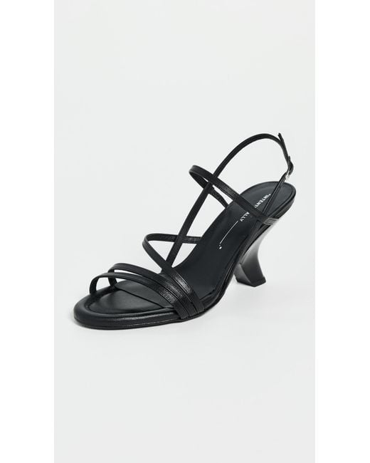 INTENTIONALLY ______ Black Launch Sandals
