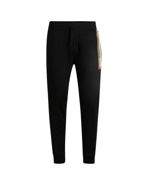 Boss Black Cotton-Terry Tracksuit Bottoms With Stripe Print for men