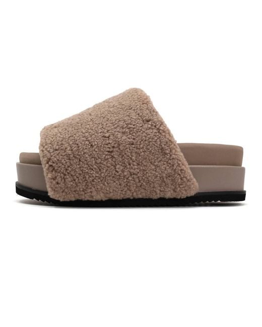 Roam Brown Fuzzy Stack Slides