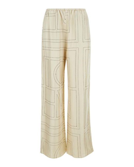 Totême  Natural Pants With All-Over Monogram