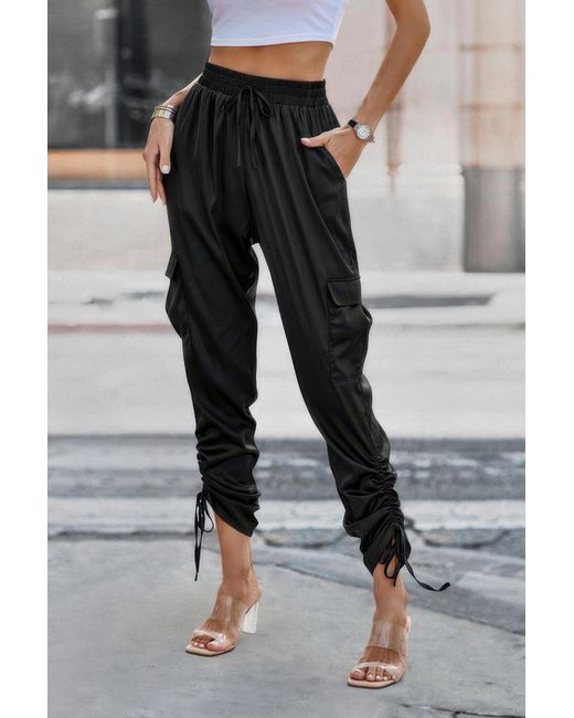 TRUEDAMES Black Solid Drawstring Hem Flap Pocket Side Stacked Pant