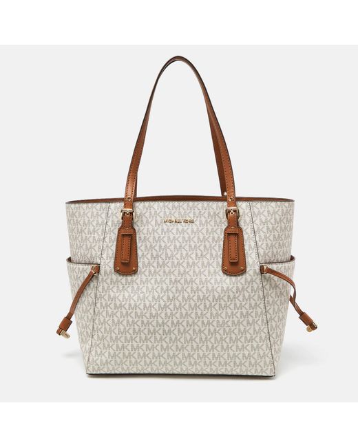 Michael Kors Gray Cream/tan Signature Coated Canvas And Leather Voyager Tote