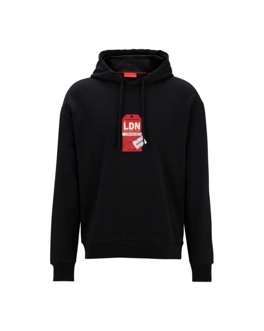 HUGO Black Cotton-Terry Hoodie With Travel-Tag Artwork for men