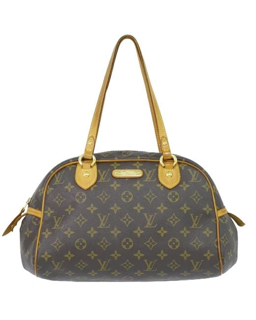 louis vuitton bag with gold plate