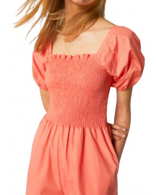 Compañía Fantástica Orange Smocked Romper
