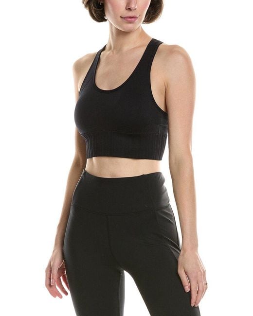 Orange turtle neck and plaid skirt