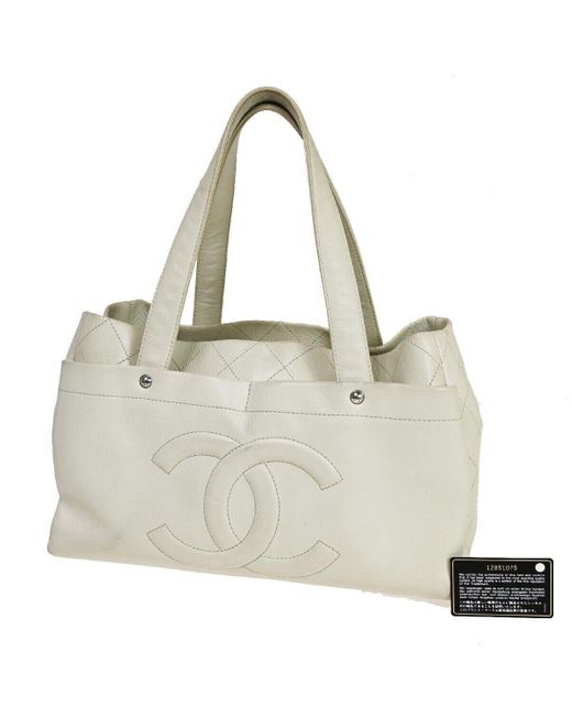 Chanel Metallic Logo Cc Leather Tote Bag (pre-owned)