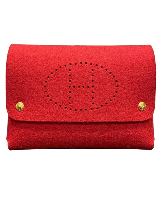 Hermès Red Evelyne Synthetic Clutch Bag (pre-owned)