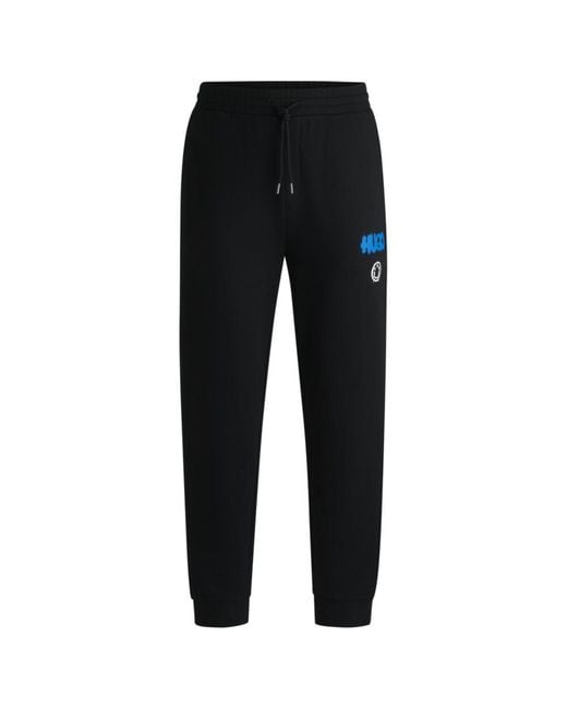 HUGO Black Cotton-Terry Tracksuit Bottoms With Happy Logo for men