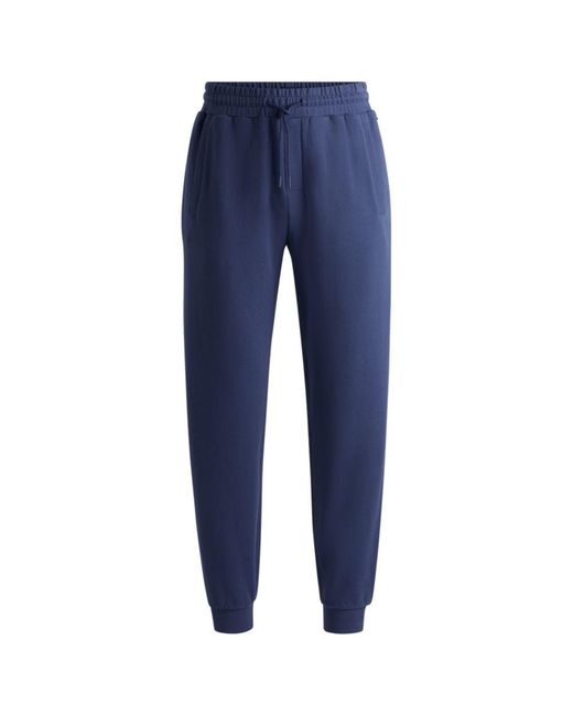 Boss Blue Cotton-Terry Tracksuit Bottoms With Flocked Logo for men