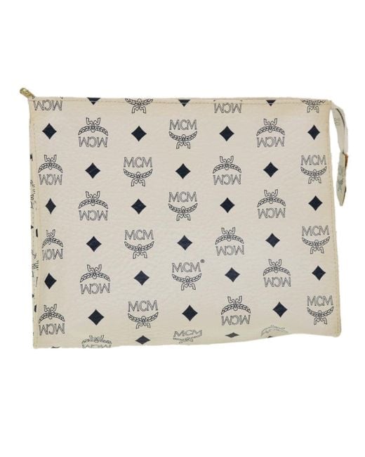 MCM Canvas Clutch Bag (pre-owned) in Metallic