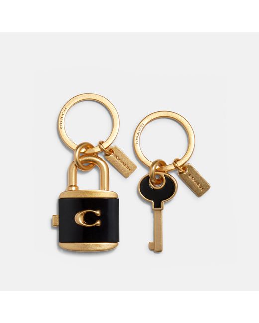 Coach Signature Lock Key Charm Huggies Earrings