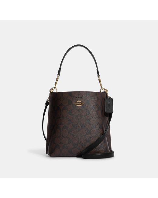 Coach Outlet Mollie Bucket Bag 22 In Signature Canvas in Gold/Brown