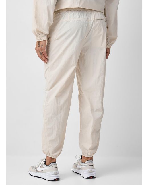 White nylon shop joggers