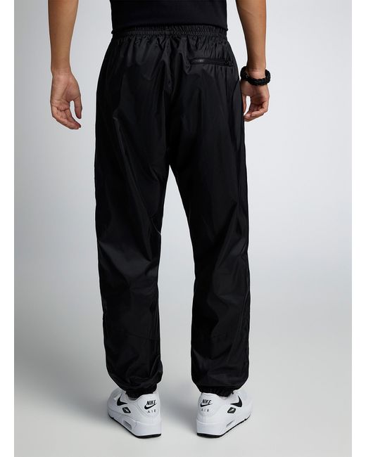 Nike Windrunner Track joggers Tapered Fit in Black for Men Lyst