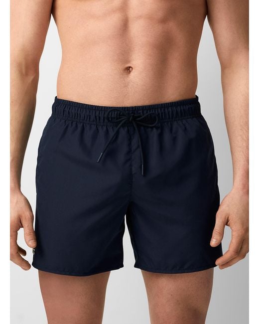 lacoste men's solid elastic waist swim trunks