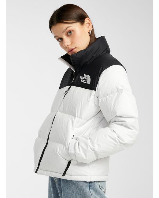 black and white north face puffer coat