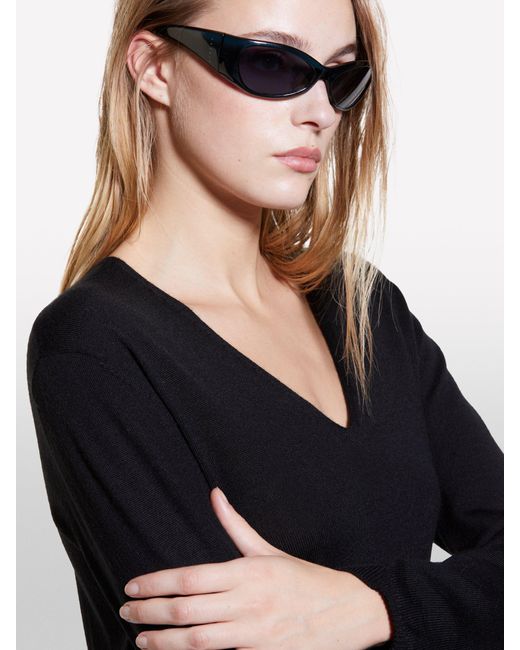 Plunging neckline sweater outlet