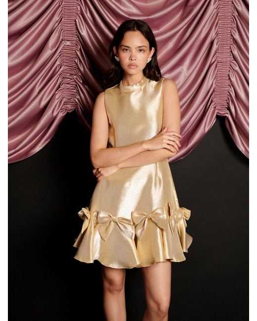 gold aso ebi dress Odd Muse Gold Bow Mini Dress – The Style Vault main image 0