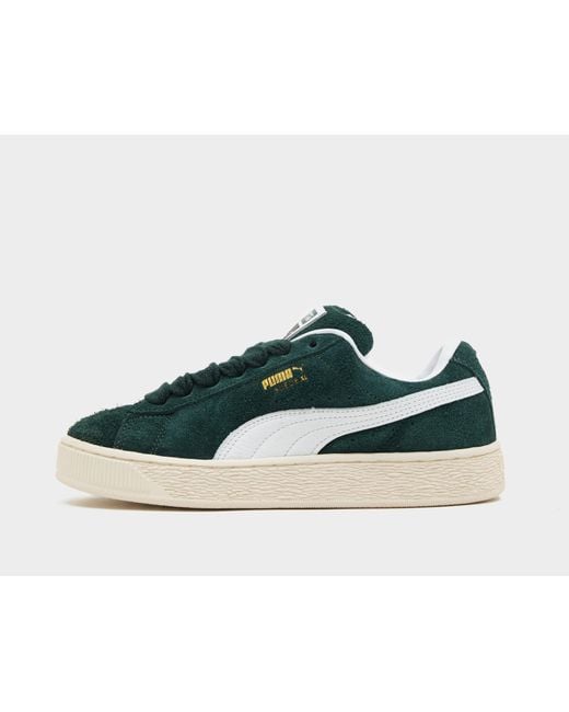 Blue and green puma suedes deals