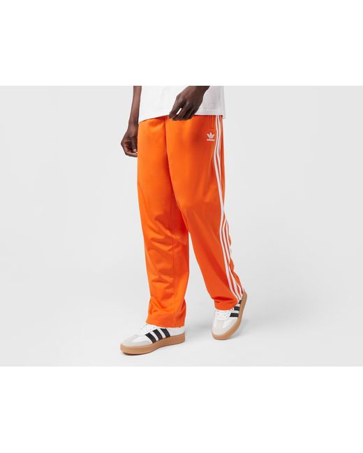 Adidas Orange Adicolor Classics Firebird Track Pants for men