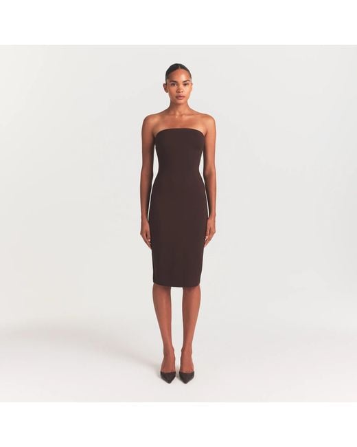 Skims Strapless Midi Dress in Brown | Lyst