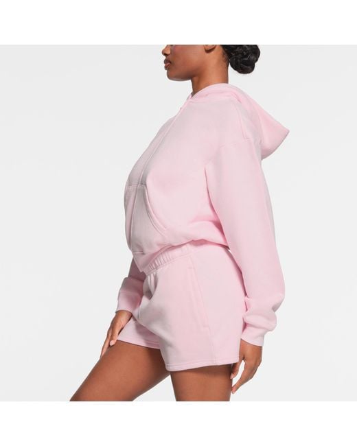 Skims Classic Zip Up Hoodie in Pink | Lyst