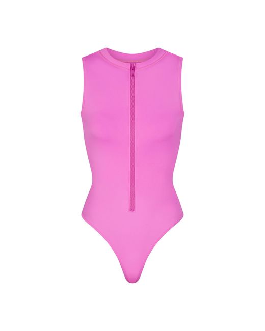 【THE MOZZ】Fizz Button Sleeveless One Piece Skims Zip Front Sleeveless One Piece in Purple | Lyst