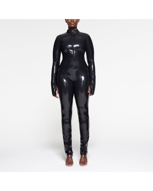 Skims Zip Front Catsuit (bodysuit) in Black | Lyst