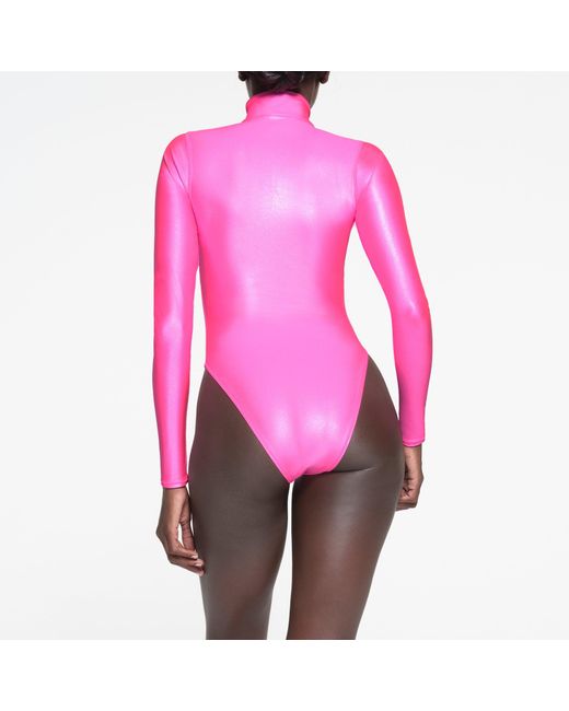 Skims Pink Zip Front Long Sleeve One Piece