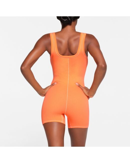 Skims Orange Onesie (bodysuit)