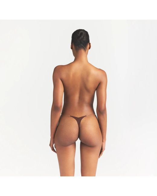 Skims Brown Clear Strap String Thong