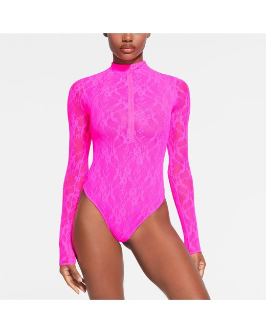 Skims Pink Lined Long Sleeve Thong Bodysuit