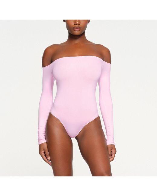 Skims Essential Off The Shoulder Bodysuit in Pink
