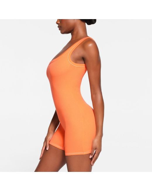 Skims Orange Onesie (bodysuit)
