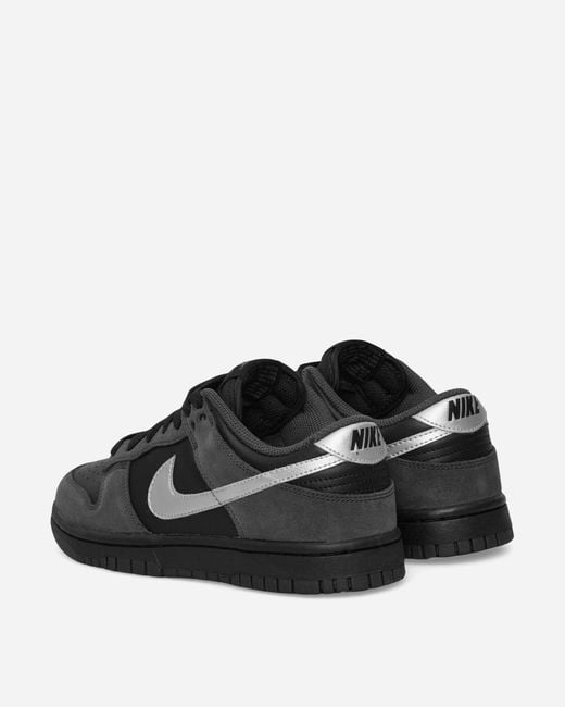 Nike Women S Dunk Low Sneakers Black / Metallic Silver