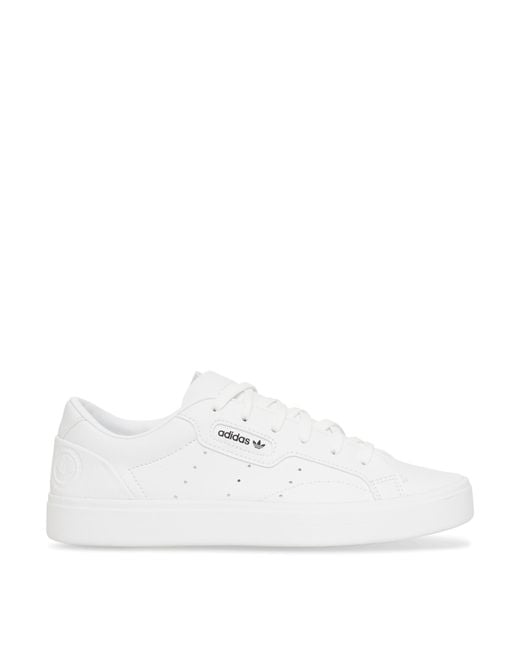 Adidas originals deals sleek white trainers