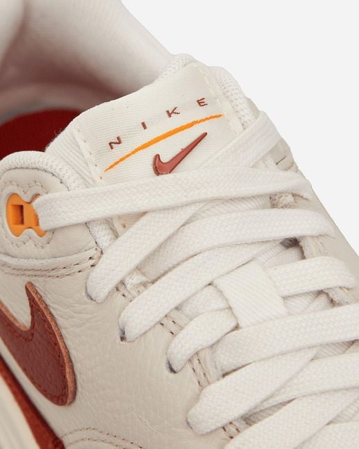 Nike White Wmns Air Max 1 Sneakers Sail / rugged Orange for men