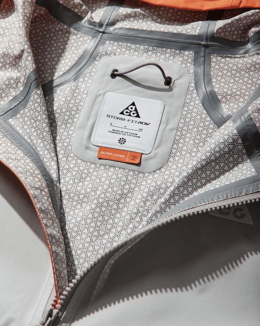 Nike Gray Women S Acg Phantazma Storm-fit Adv Jacket Safety Orange / Grey Fog