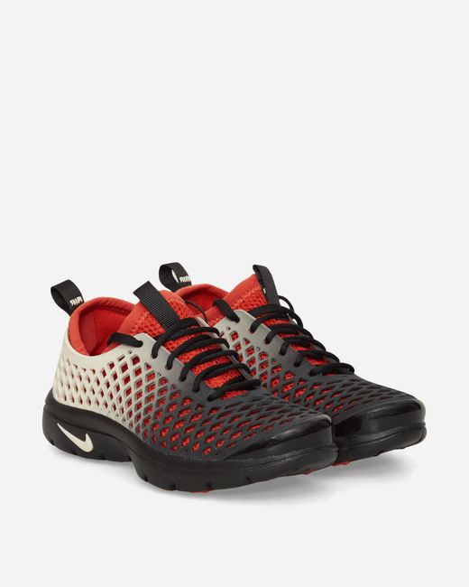 Nike Red Women S Rejuven8 Sneakers / Rust Factor