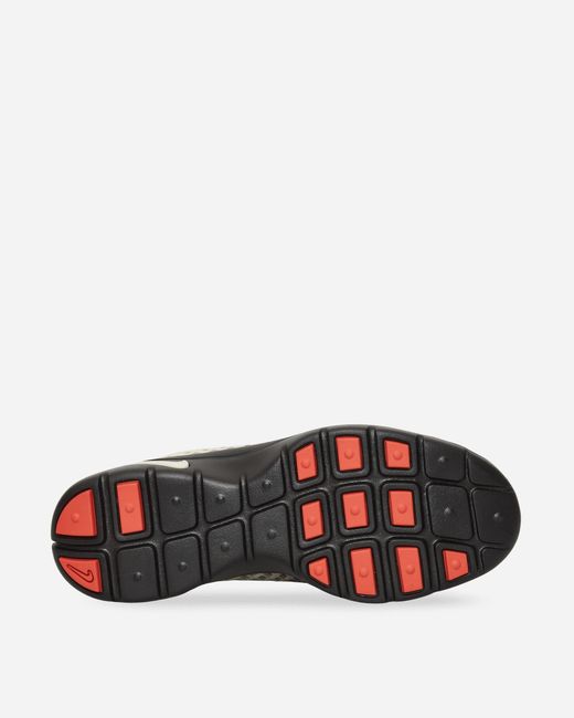 Nike Red Women S Rejuven8 Sneakers / Rust Factor